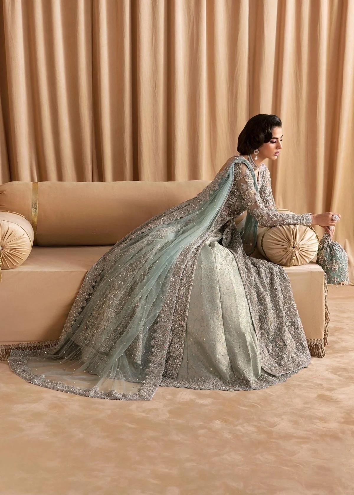 RIJA I KANWAL MALIK clothing in blue tones.